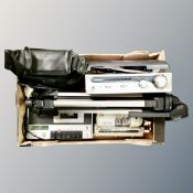 A box containing camera tripod, Sanyo video camera in bag, Bush record player,