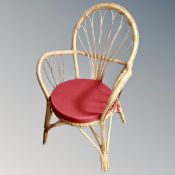 A 20th century bamboo and wicker armchair.