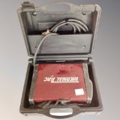 A thermal arc welder in case . Model no.