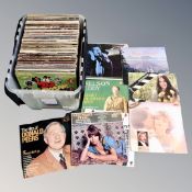 A crate containing vinyl LPs including compilations, easy listening, musicals etc.