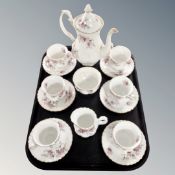A tray of Royal Albert Lavender Rose tea china.