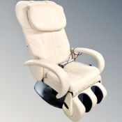 A Human Touch HT-125 full body massage armchair upholstered in leather.