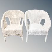 A pair of 20th century painted white basket chairs.