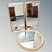 A pair of gilt framed mirrors, together with a further circular gilt framed bevel edge mirror.