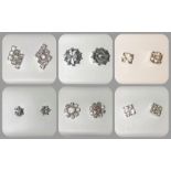 A collection of various diamante stud earrings.