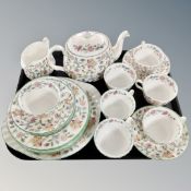 A tray of Minton Haddon Hall tea china.