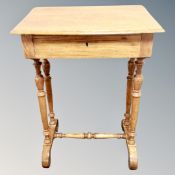 A 19th century oak worktable fitted with a drawer.