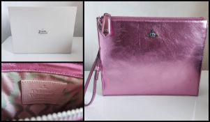 Vivienne Westwood pink shimmering clutch pouch with its original box and inside dividers. 26 cm.