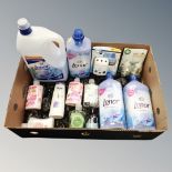 A box containing assorted hand soaps, Lenor fabric softener and plug-in air fresheners, new.