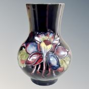 A Moorcroft pottery Clematis vase (height 11cm)