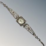 A silver Swiss lady's wristwatch with mother of pearl dial, Sterling silver Birmingham import marks,