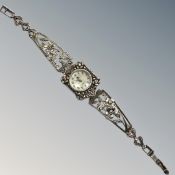 A silver Swiss lady's wristwatch with mother of pearl dial, Sterling silver Birmingham import marks,