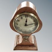 A French Art Nouveau copper-effect metal mantel clock