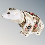 A Royal Crown Derby polar bear paperweight with stopper.