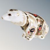 A Royal Crown Derby polar bear paperweight with stopper.