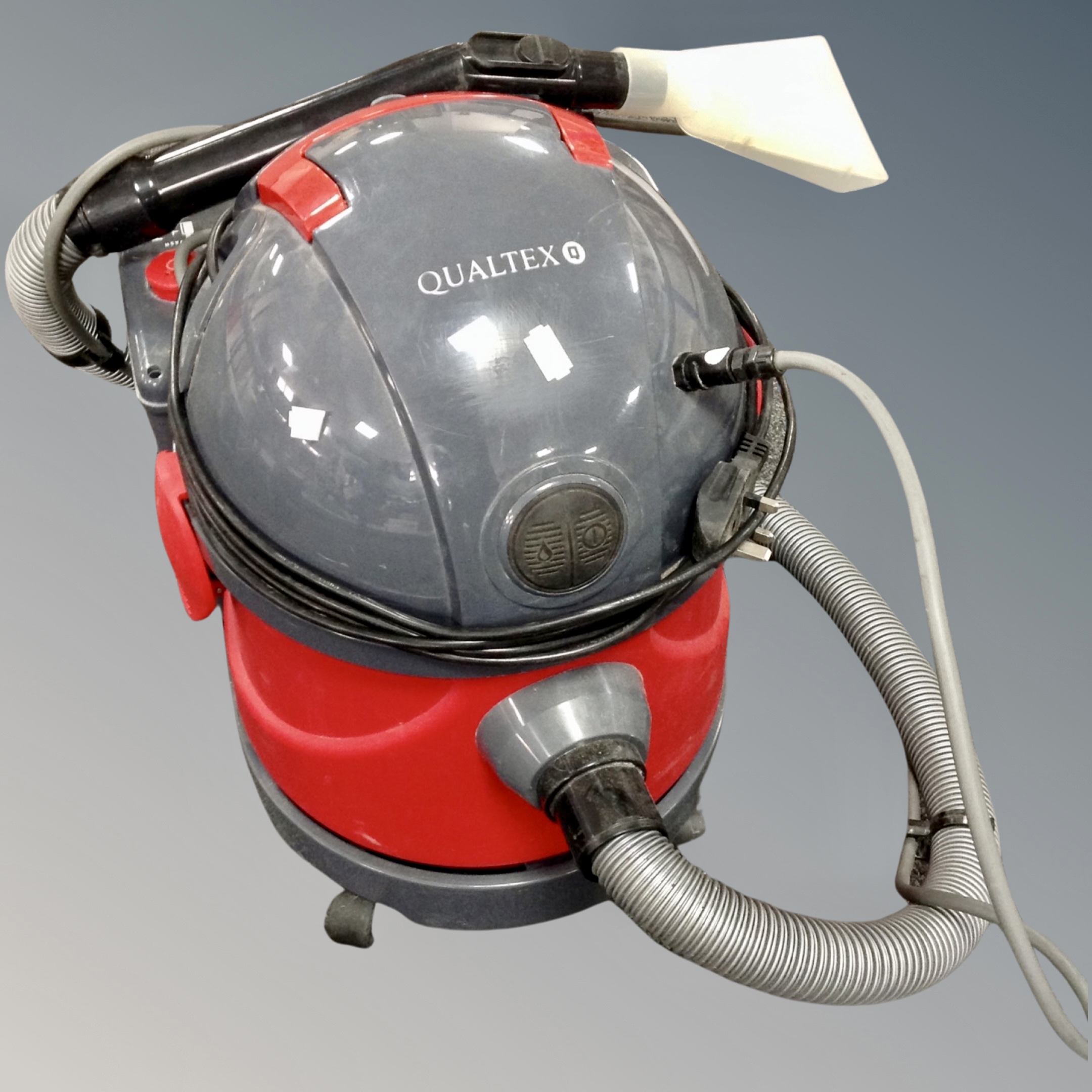 A Qualtex professional carpet cleaner.