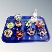 A tray of nine assorted glass paperweights, Selkirk,