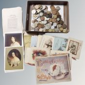 A tray containing predecimal coins, world coins, antiquarian postcards.