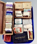 A tray of wooden table boxes, tea cards, playing cards, Benson and Hedges cigarettes, vintage tins,