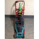 A Bosch Rotak 34 electric lawn mower with grass box,
