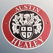 A cast iron wall plaque, Austin Healey.