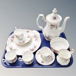 A tray containing a Royal Albert Lavender Rose part china tea set.