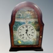 A contemporary eight day bracket clock with key with hunting scene dial