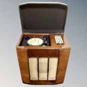 A mid-century Alba gramophone with Garrard model R.L.70B turntable, in a walnut cabinet.