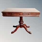 A Victorian style pedestal hall table fitted with two drawers.