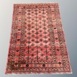 A Bokhara rug, Afghanistan, 184cm by 127cm.
