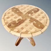 A circular marquetry inlaid pedestal occasional table.