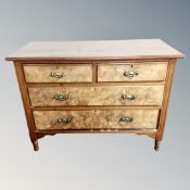 A late 19th century walnut two-over-two chest of drawers.