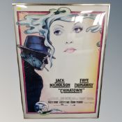 A Chinatown movie poster in frame.