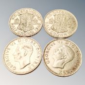 Four George VI half crowns.