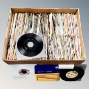 A box containing a large quantity of 20th century vinyl 7" singles including The Boomtown Rats,