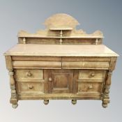 An antique pine farmhouse sideboard