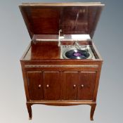 A 1930s gramophone in cabinet.