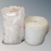 A roll of bubble wrap together with a bag containing a quantity of bubble wrap and bubble pouches.