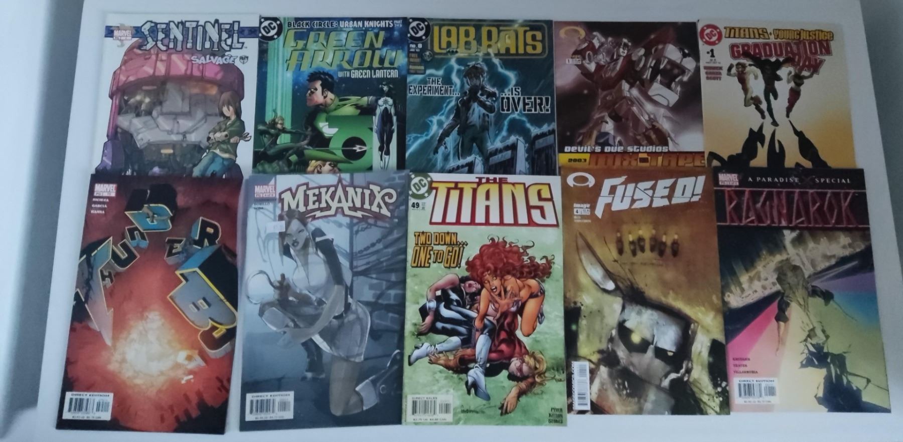 A collection of DC and Marvel comics.