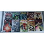 A collection of DC and Marvel comics.
