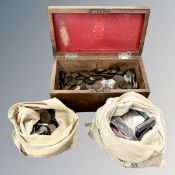 A Victorian mahogany box and two money sacks containing a large quantity of antique and later coins,