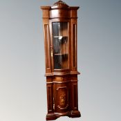 An Italian style glazed door display cabinet fitted with a cupboard and drawers beneath.