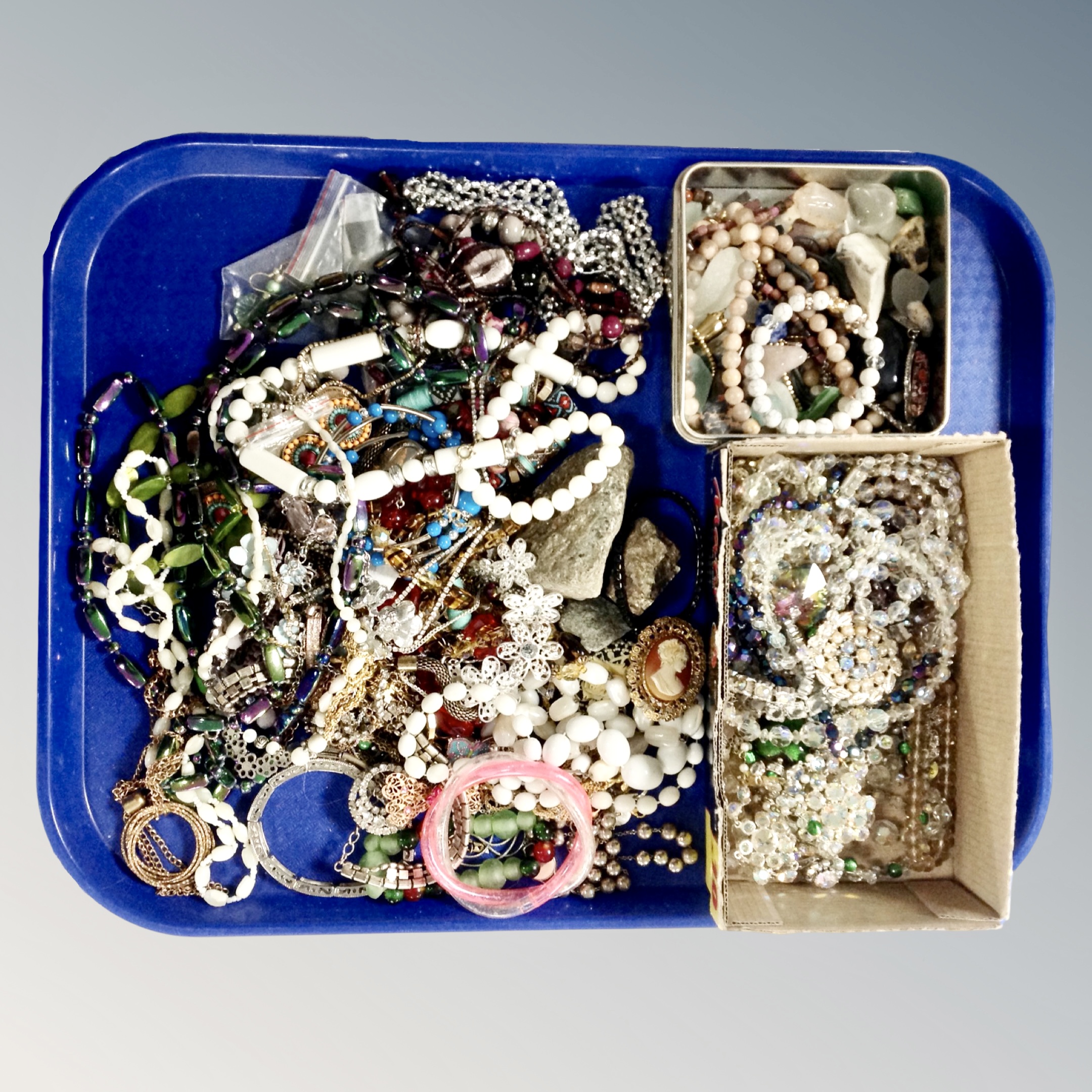 A tray of various costume jewellery, bead necklaces,