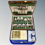 A tray of Edwardian canteen of plated and stainless cutlery together with further set of six