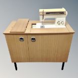 A Singer Futura cabinet sewing machine