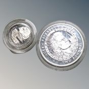 A silver Queen Elizabeth II £2 coin, together with silver 1997 Guernsey £1 coin.