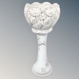 A Portuguese ceramic white and gilt jardiniere on stand