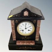 A Victorian black slate and marble eight day mantel clock with pendulum and key