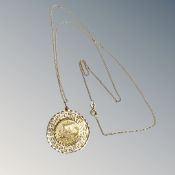 An 18ct yellow gold pendant with Greek style decoration suspended on 18ct yellow gold chain, 8.2g.
