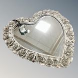 A Gallery Home contemporary silvered framed heart-shaped mirror,